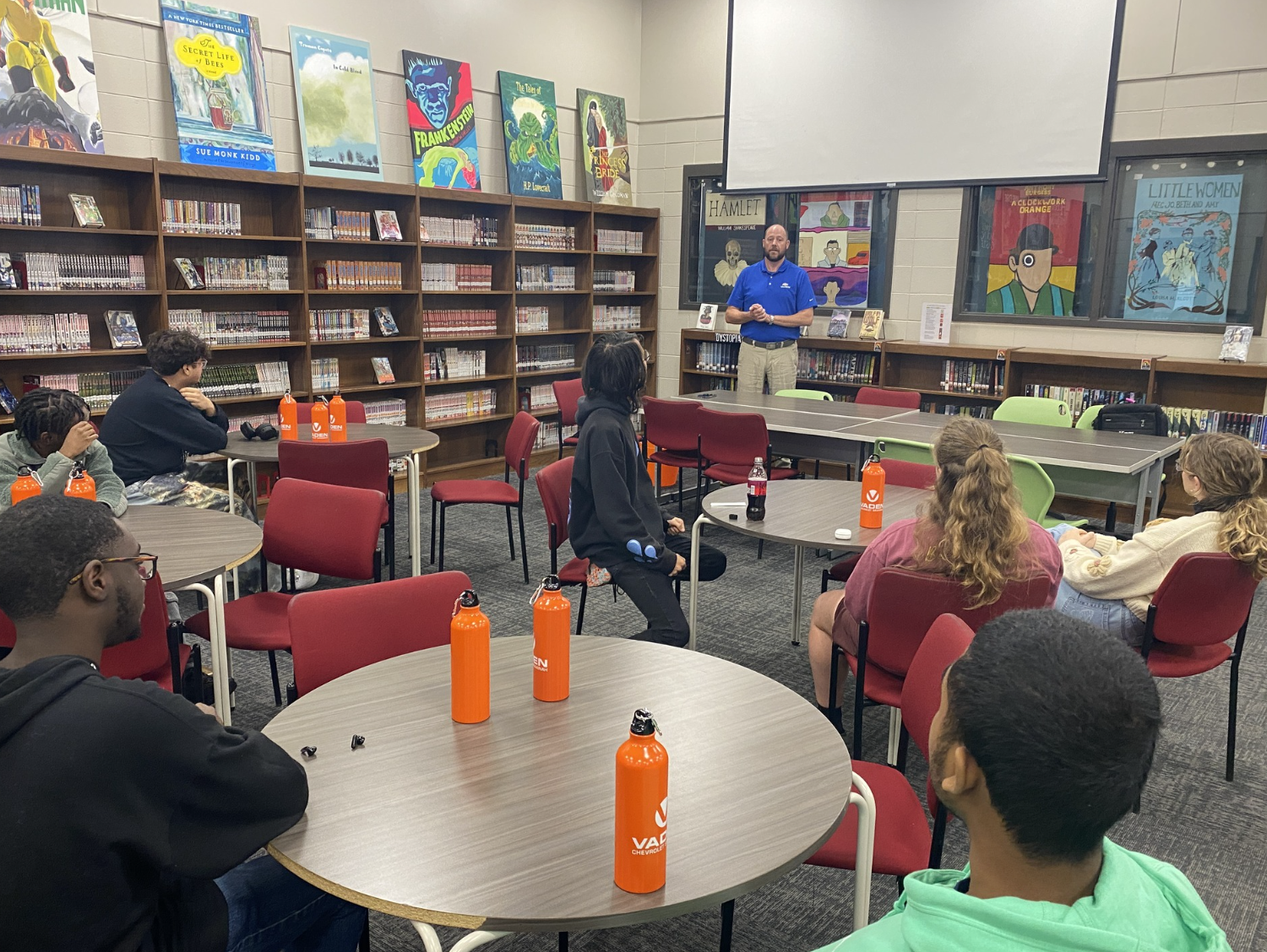Students learning car buying tips at Vaden Automotive workshop
